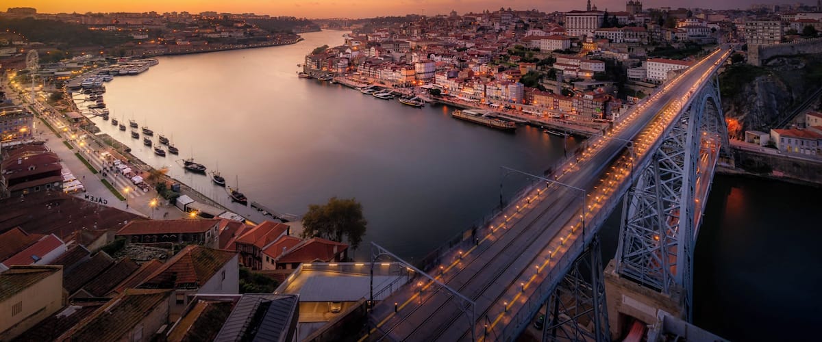 This is the well known and iconic view of the downtown in Porto, Portugal from the Miradouro da Serra do Pilar. If you planning to enjoy a view like this you have to start the trip earlier as it is fair bit of a walk to get there and the spot is very popular among the tourists and photographers. But if you there at the right time you can enjoy this scene with Douro River and Luís I Bridge.