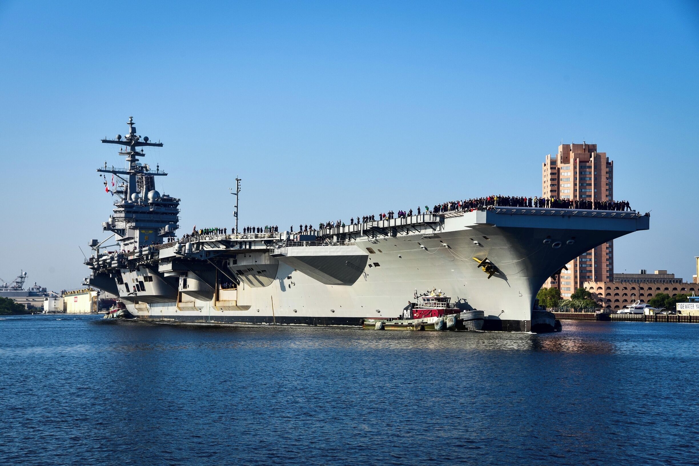 The USS George H.W. Bush (CVN 77) makes its way to sea after a year long PIA at Norfolk Naval Shipyard.