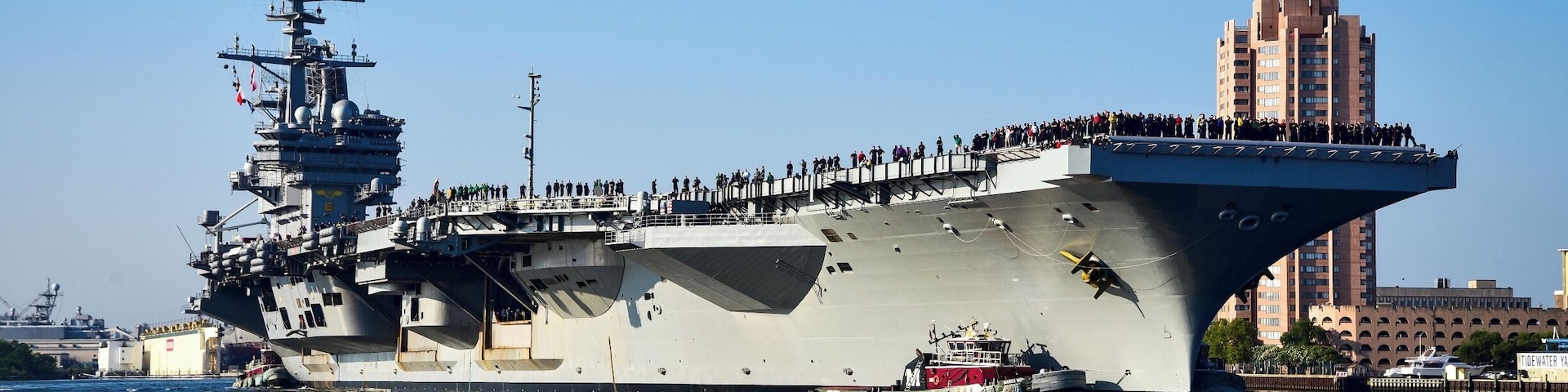 The USS George H.W. Bush (CVN 77) makes its way to sea after a year long PIA at Norfolk Naval Shipyard.