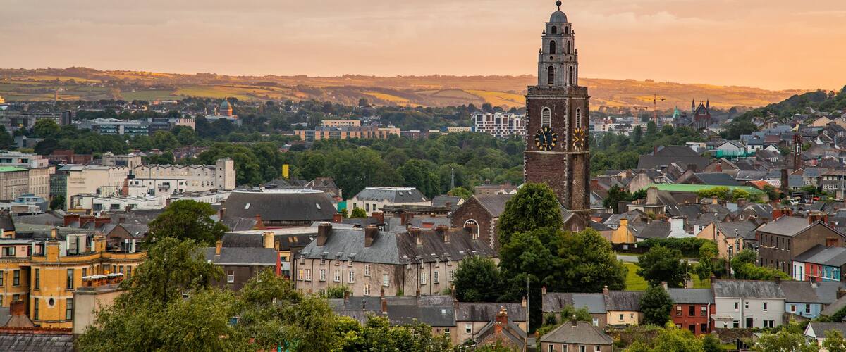 Cork featuring a city, landscape views and a sunset