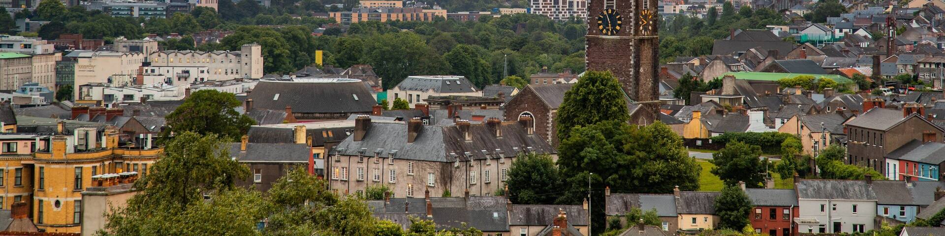 Cork featuring a city, landscape views and a sunset