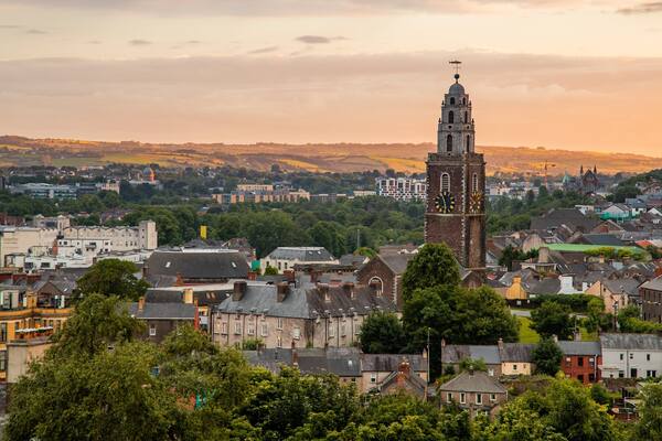 Cork featuring a city, landscape views and a sunset