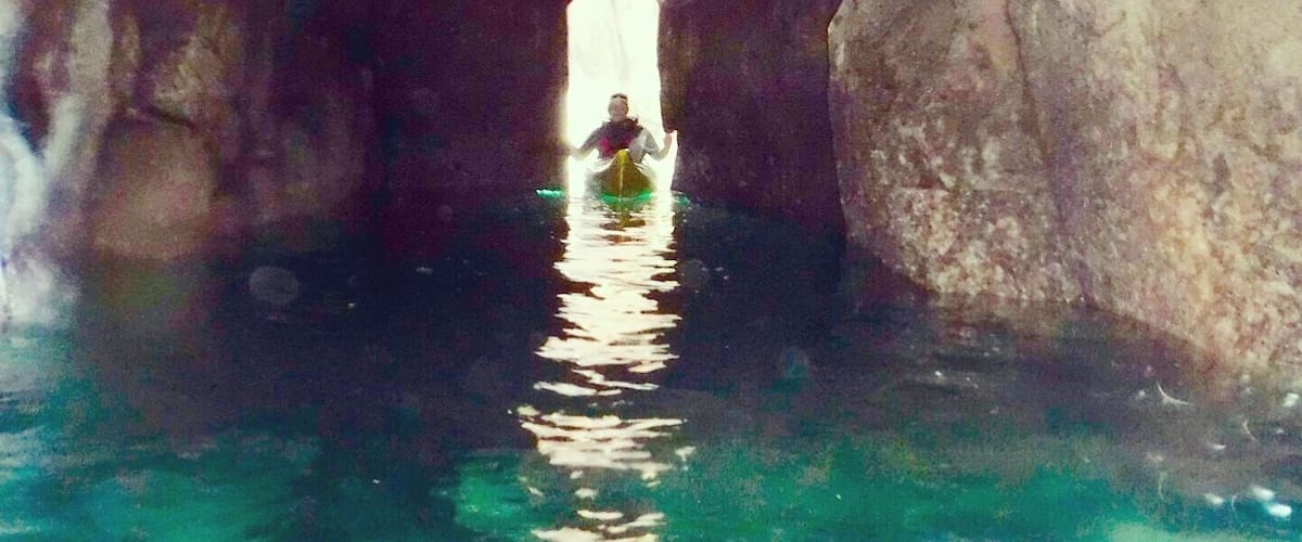 Kayaking on the coast of the Dingle peninsula will allow you to explore aquatic caves like this one created by cliffs too close together.  A picture does not capture the true beauty of the area. 
#dingle #ireland #europe #water #kayaking #seakayaking