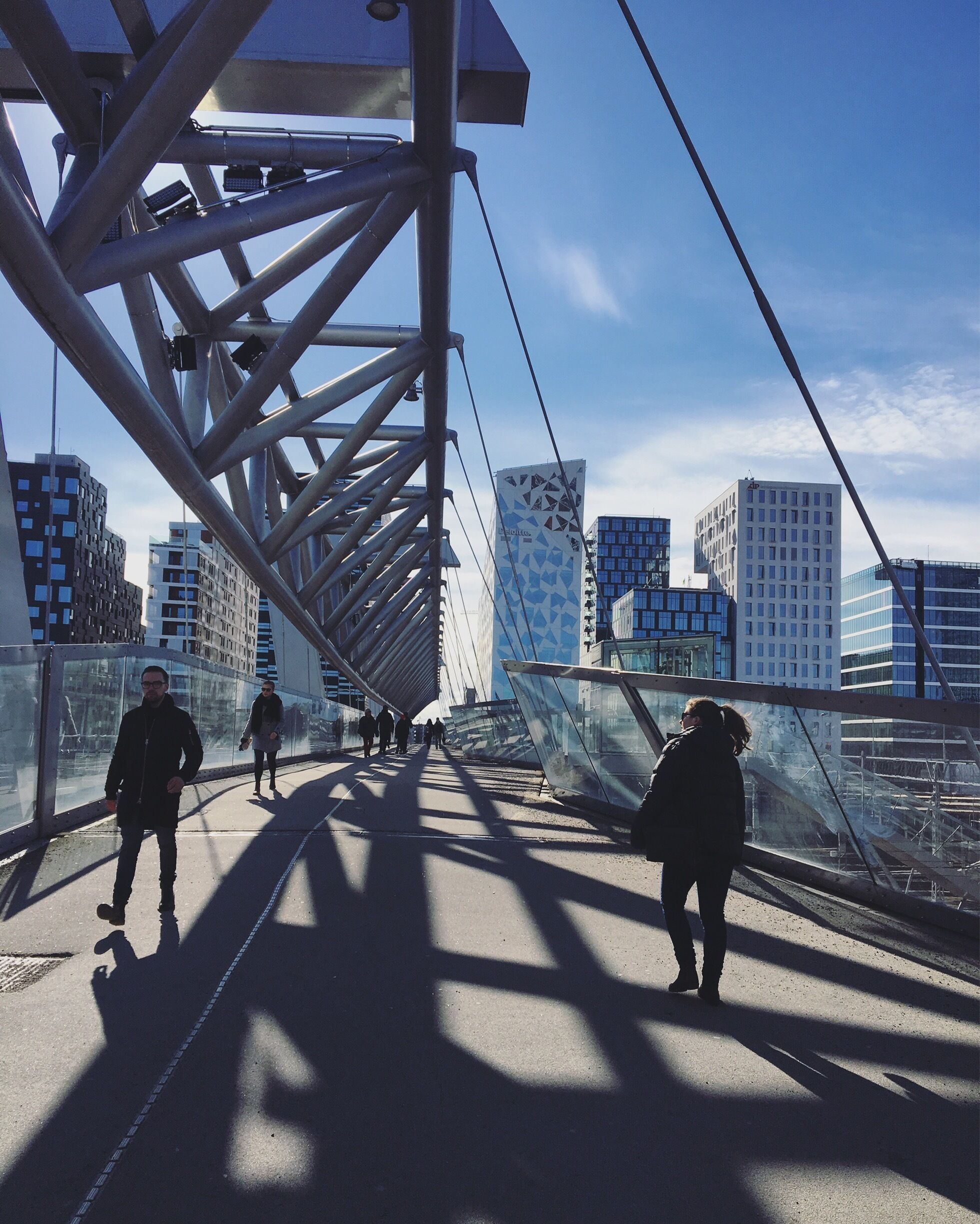 On the bridge overlooking the Barcode skyline in central Oslo.