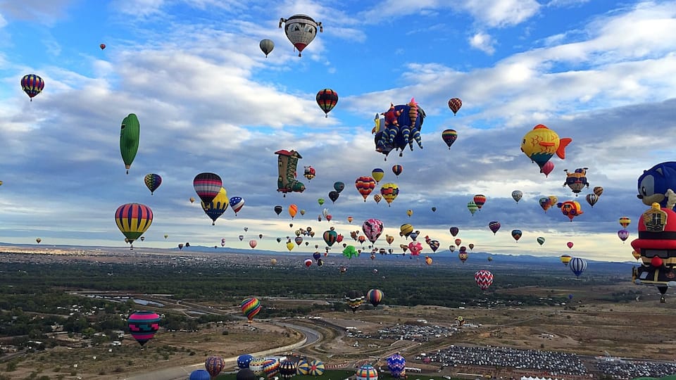 Hundreds of balloons for the hot air balloon fiesta in Albuquerque. My view from one of them. #visitabq #balloonfiesta #beautifulcolors #amazingviews #blue
