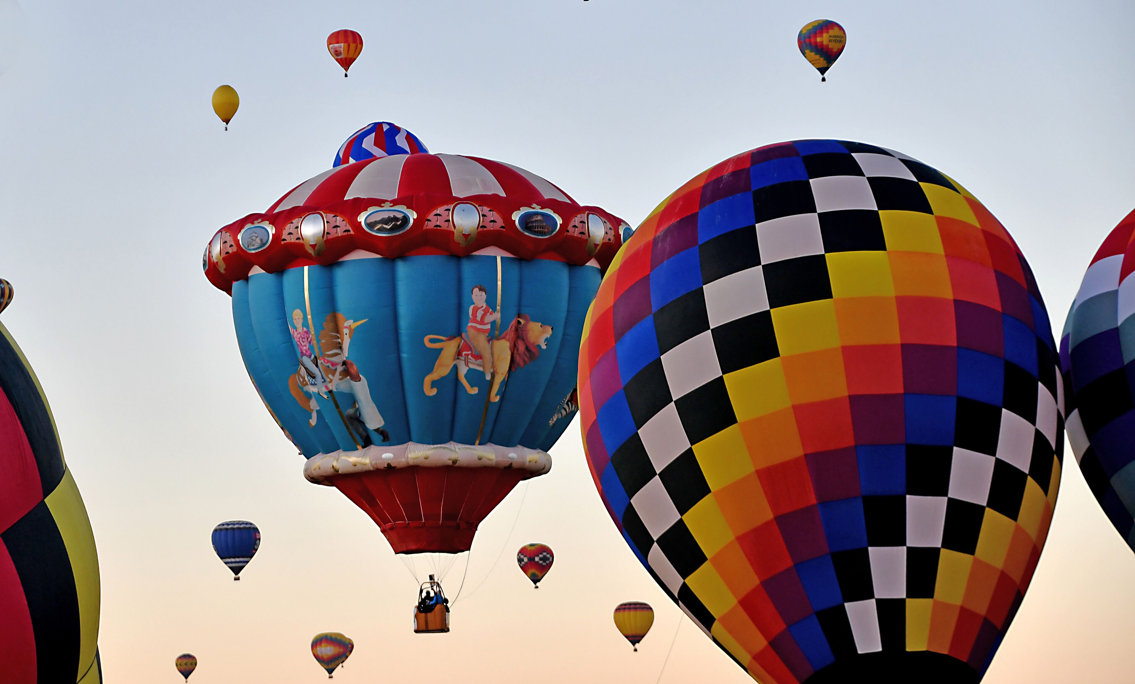 Mass Accession. The last Saturday of the 2019 Fiesta there were around 600 hot air balloons scheduled to go up. Organized chaos is the best way to describe it.  Color, sounds, people everywhere.  It was great.

#Trovember