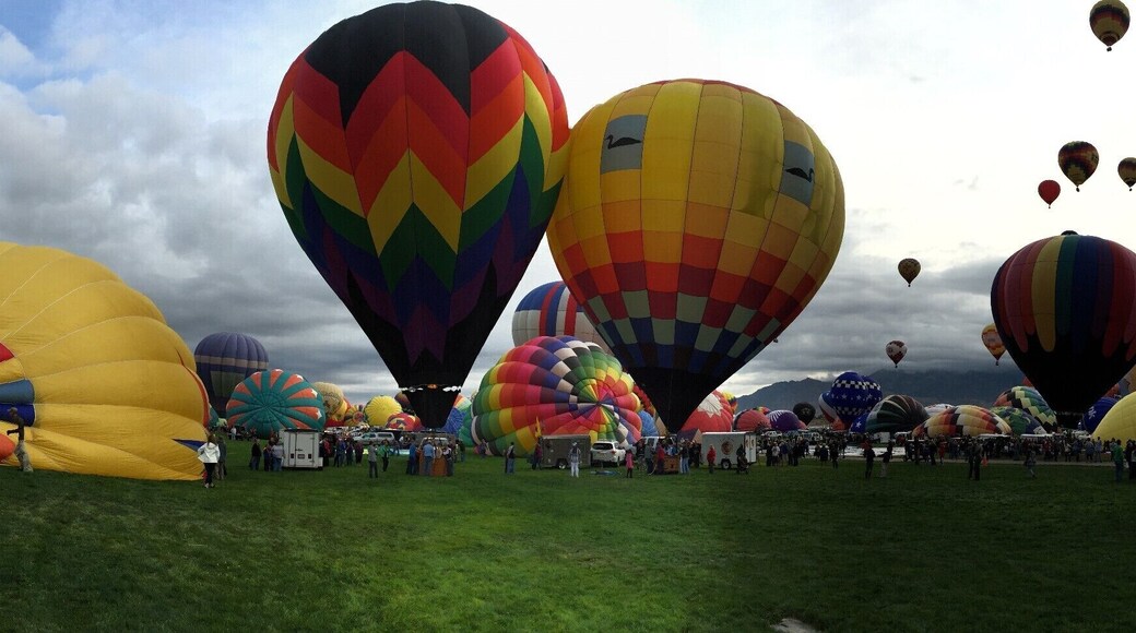 One of the best weekend vacations I've ever spent was in Albuquerque, New Mexico at the International Balloon Festival! You can walk among the balloons and watch them "wake" and rise. What a joy!