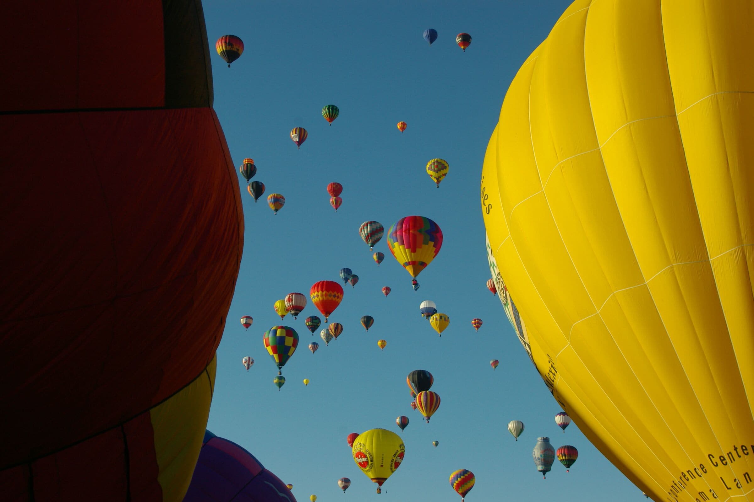 A sky filled with colorful hot air balloons.