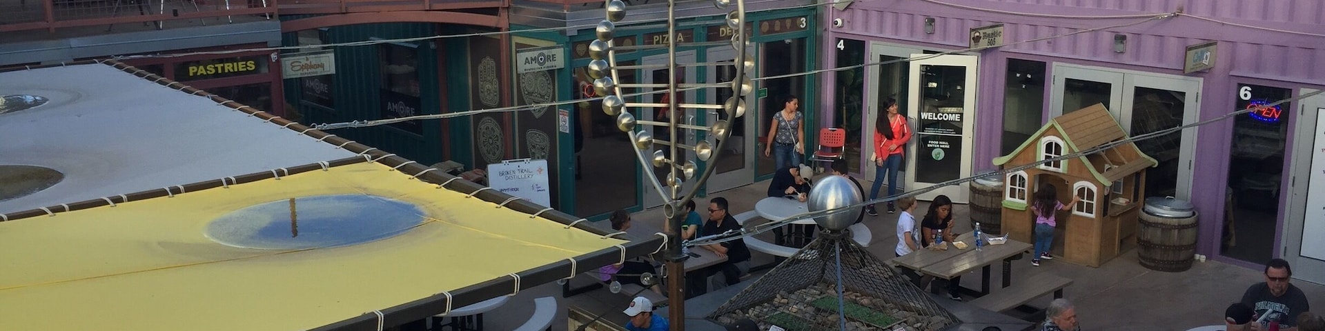 Rooftop view of the center of Green Jeans, a brewery and eatery made completely of recycled shopping containers. All good, beer, and art are locally made.