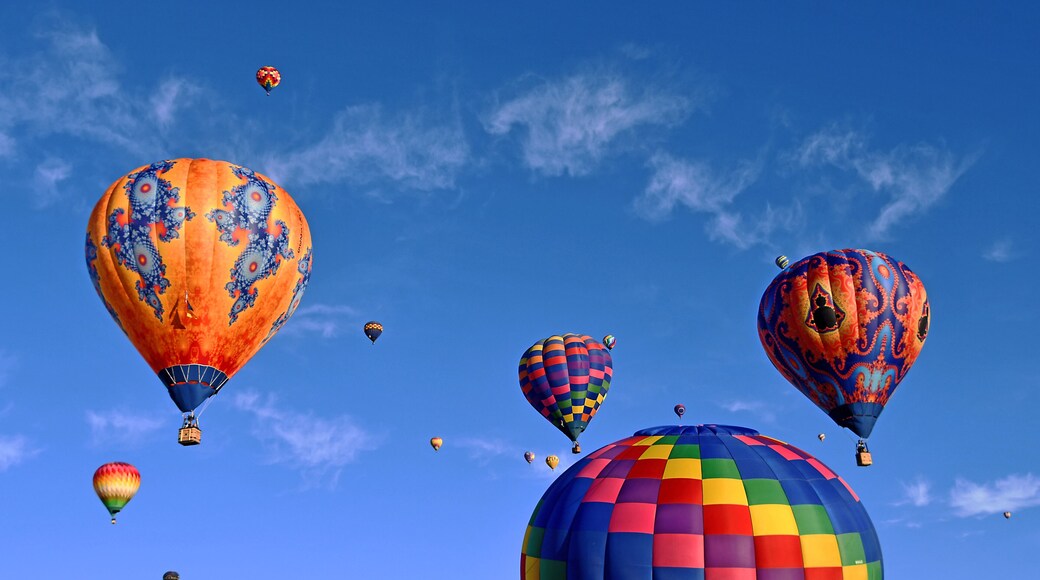Mass Accession. The last Saturday of the 2019 Fiesta there were around 600 hot air balloons scheduled to go up. Organized chaos is the best way to describe it. Color, sounds, people everywhere. It was great!