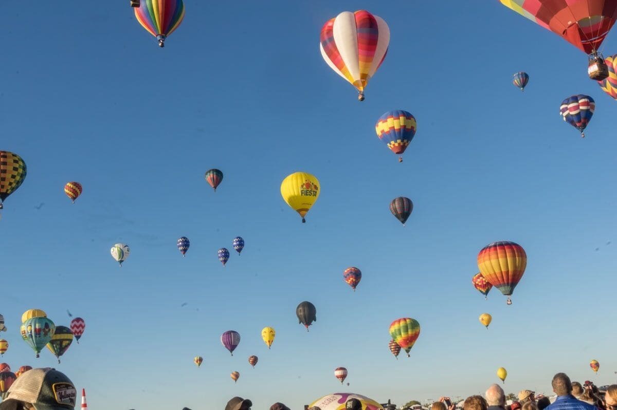 A sky filled with colorful hot air balloons.