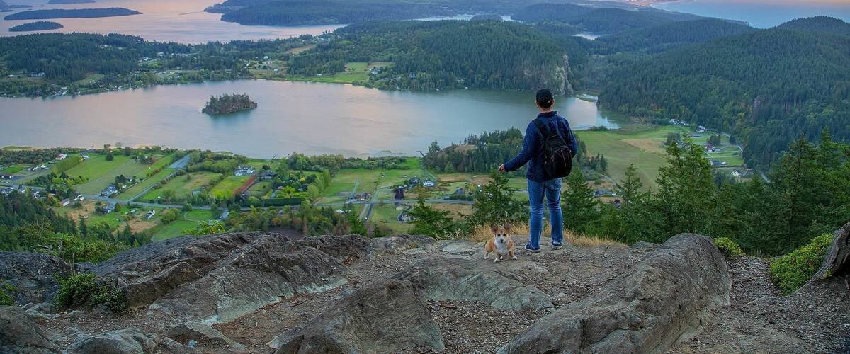 What better way to enjoy this view than with man's best friend? #Golden moment at the top of Mt. Erie by Anacortes in Washington State.
