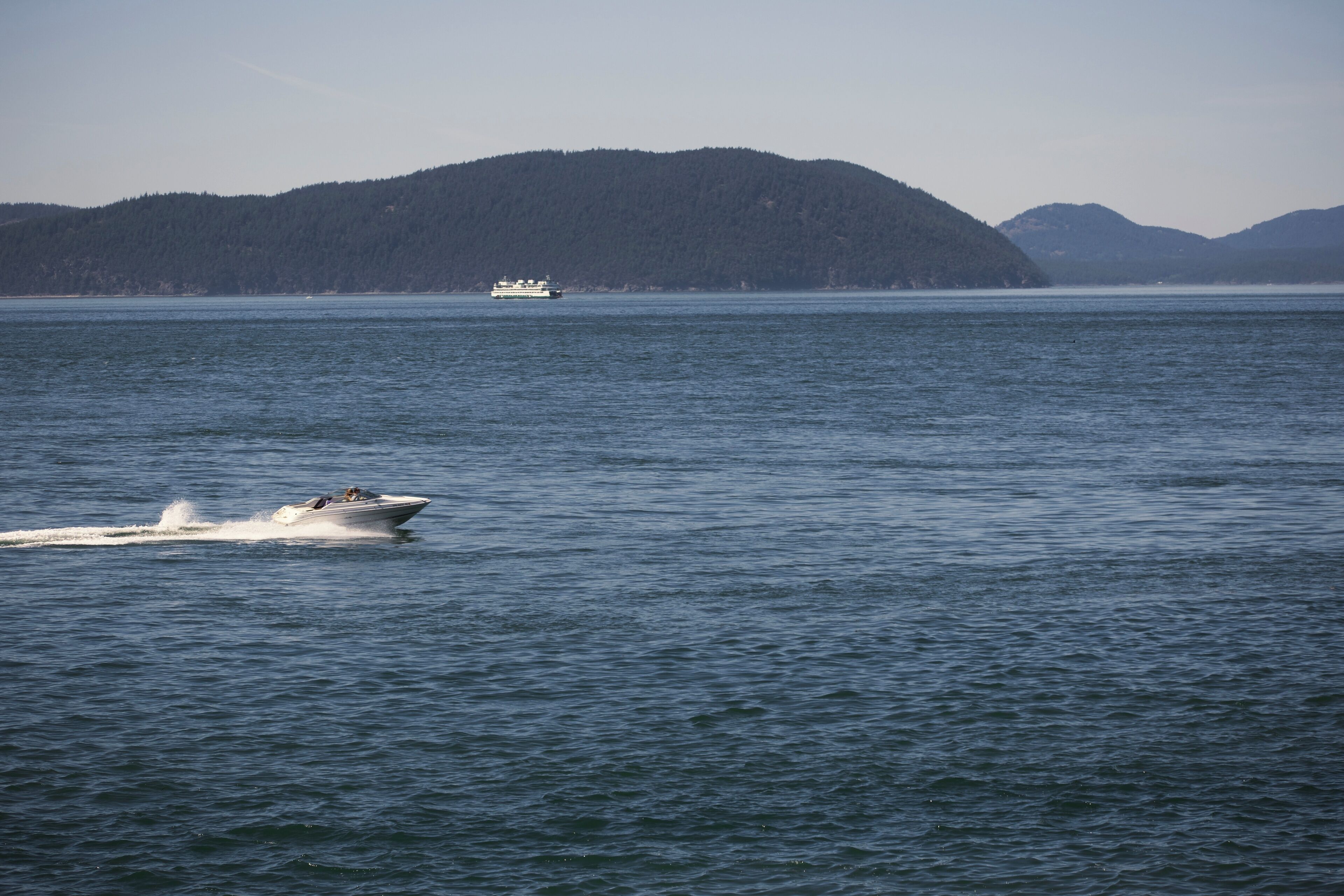 Pre-Mother's Day jaunt - all within 30 miles of our house. Nikon D3400. It was a beautiful day but a little hazy which made photography challenging.

From Washington Park in Anacortes. 70-300mm zoom set at 70 mm, ISO 100, f/5.6, 1/1000 sec. Ferry in background heading to San Juan Islands.
