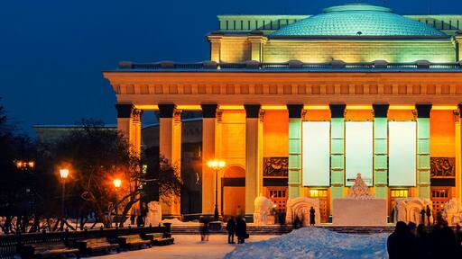 Illuminated Novosibirsk Opera and Ballet Theater is popular place in Siberia, Russia
