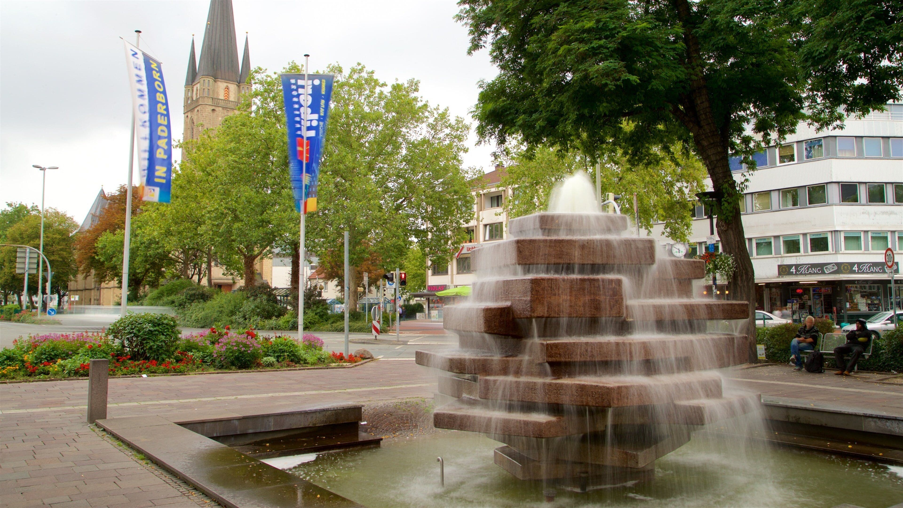 Paderborn featuring a fountain, flowers and a park