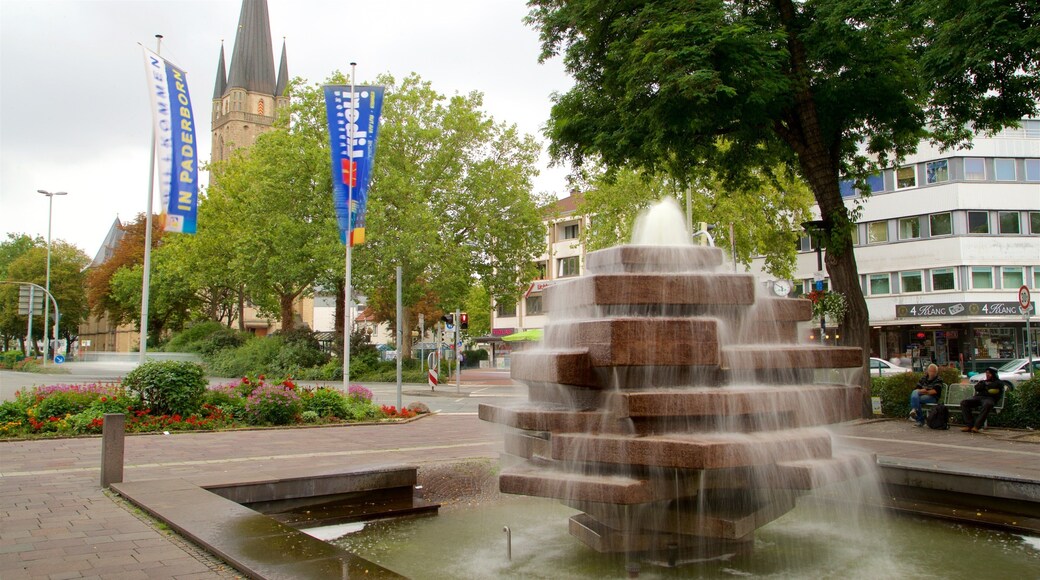 Paderborn featuring a fountain, flowers and a park