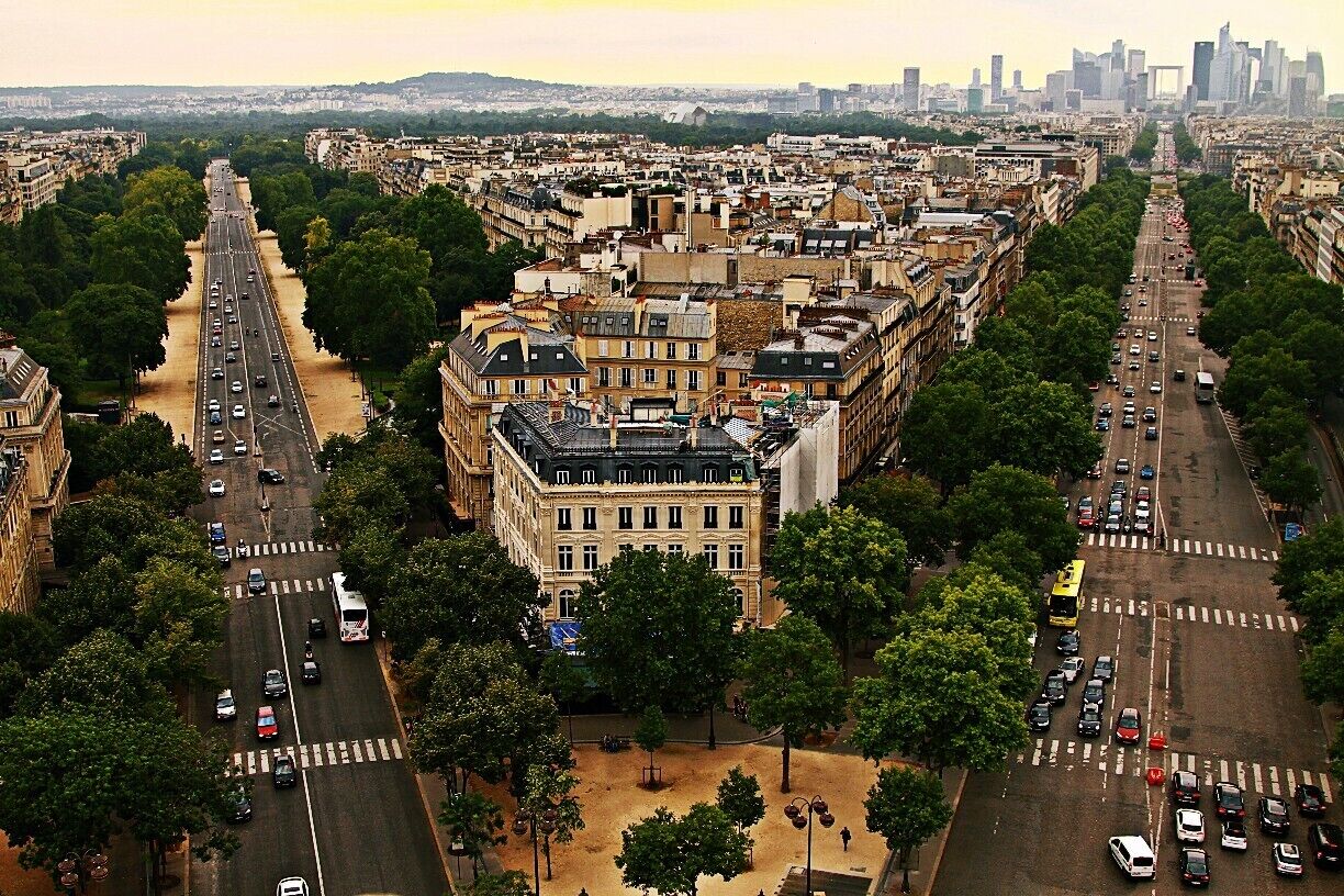 #troverdetour

The Arc de Triomphe is one of the most famous monuments in Paris. It stands in the centre of the Place Charles de Gaulle (originally named Place de l'Étoile), at the western end of the Champs-Élysées.The Arc de Triomphe honors those who fought and died for France in the French Revolutionary and the Napoleonic Wars, with the names of all French victories and generals inscribed on its inner and outer surfaces. 
The views from  the top of the 50 m tall Arc De  Troimph are mind blowing as it provides beautiful views of the city, as its in the centre of the Place De Etoile.
The 12 beautiful avenues, including the beautiful Champs Elysees radiate to form the star for which the Place De Etoile is named. Beautiful avenues, lined with lush green trees, and the sheer geometry of the buildings, the uniformity in the color. I  was admist a huge crowd of people, yet allowed myself the joy of admiring this moment - the sheer magnitude of the arc, the sunlight playing on the buildings, the gentle breeze, the distant rumbling of traffic and me in the middle of it all....Surreal!!!