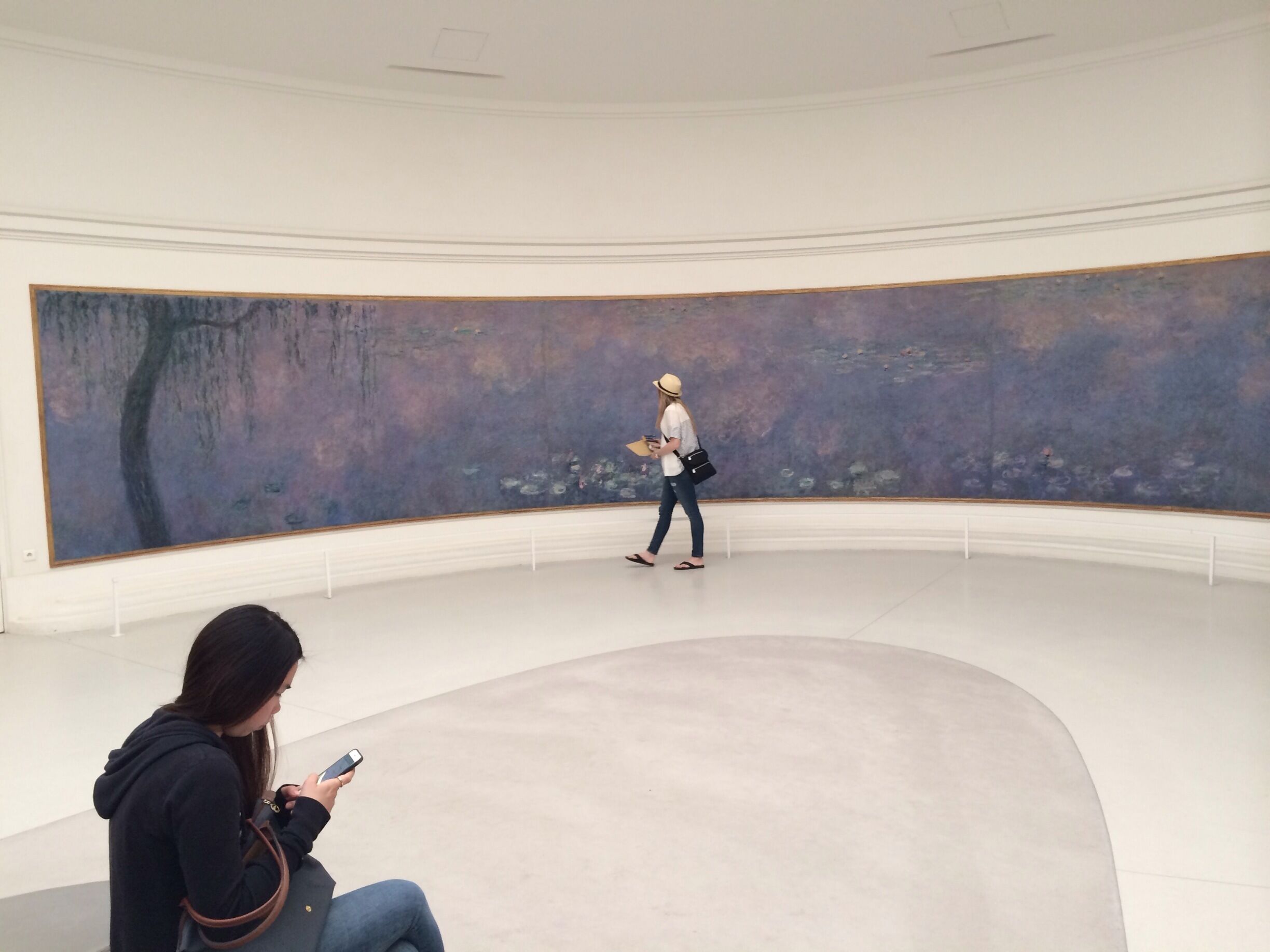 This was my favorite art piece in Paris.  Not as popular as the Louvre or Musee de orsay, but it house's Monet's water lilies. Two rooms encircled with the water lilies of Monet's garden shifting from early morning sunrise to the darkness of sunset. The colors are amazing. 