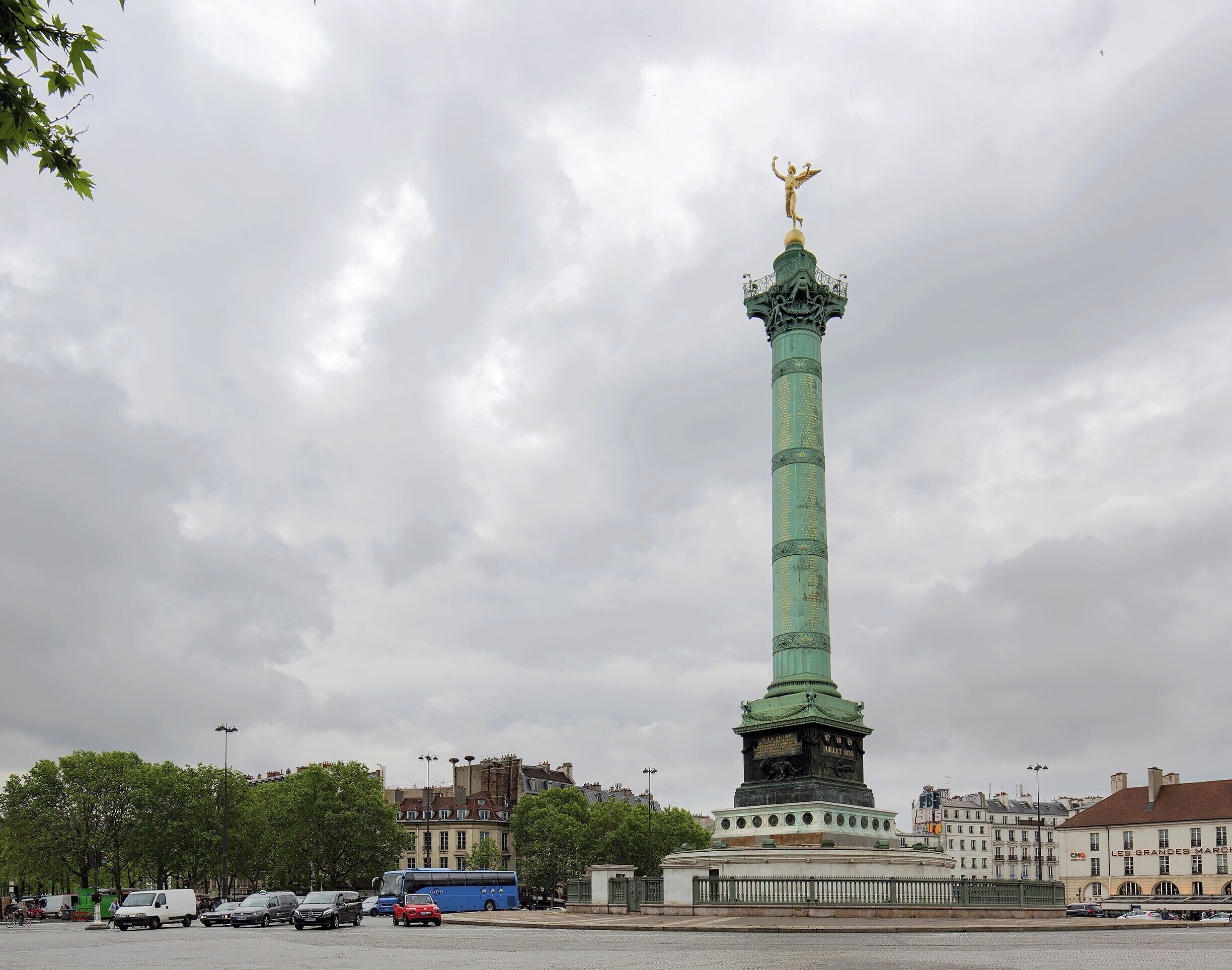 The Judy Column on a moody day in Paris.

Although you might expect the column to commemorate the French Revolution and the storming of the Bastille prison, the column actually celebrates the Revolution of 1830.  The bronze column is 154 ft (47 m) high and is topped with a gilded figure representing Auguste Dumont's "Spirit of Freedom" and holding up the torch of civilization.