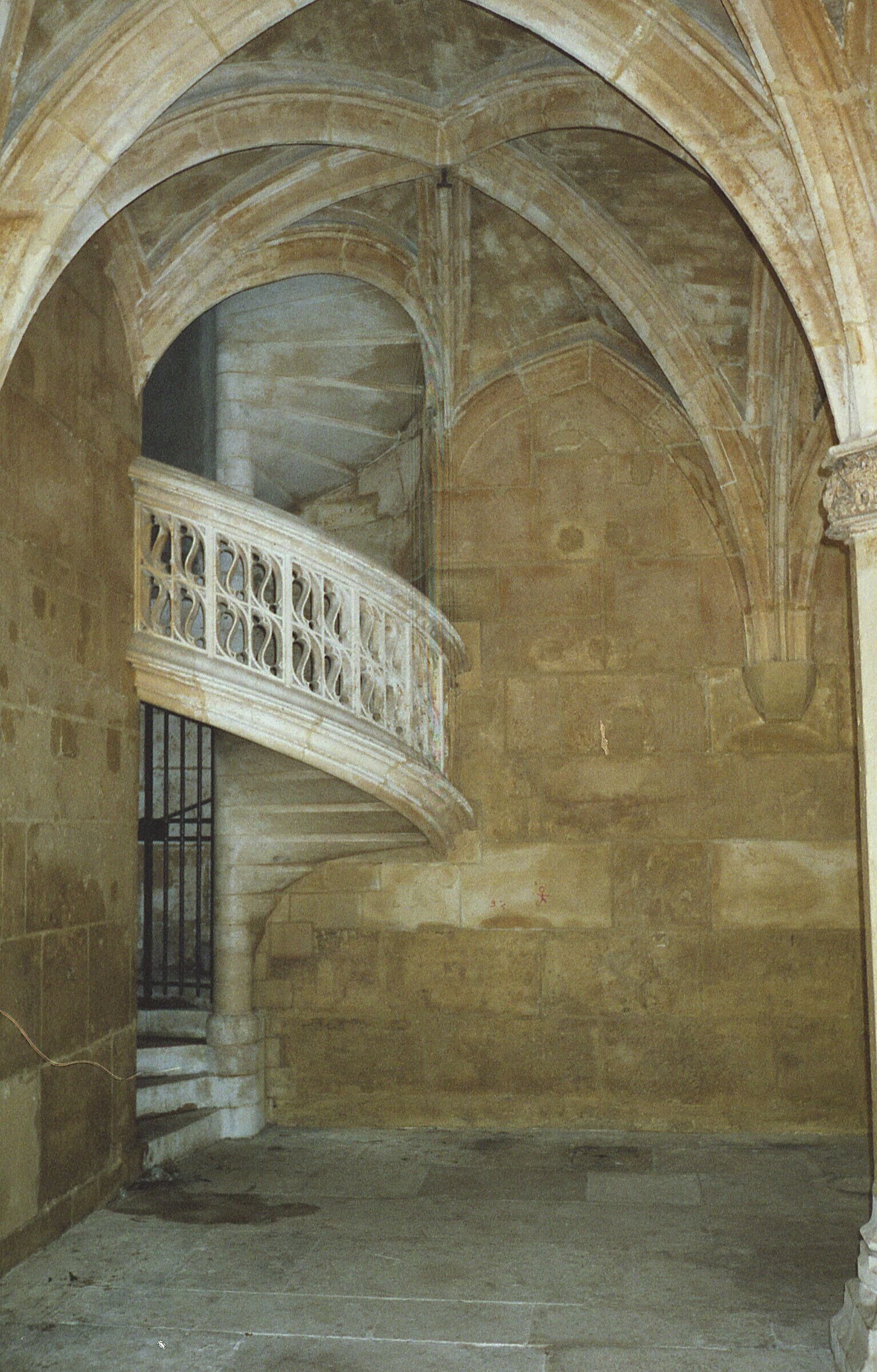 I like the delicate stone filigree in the handrail