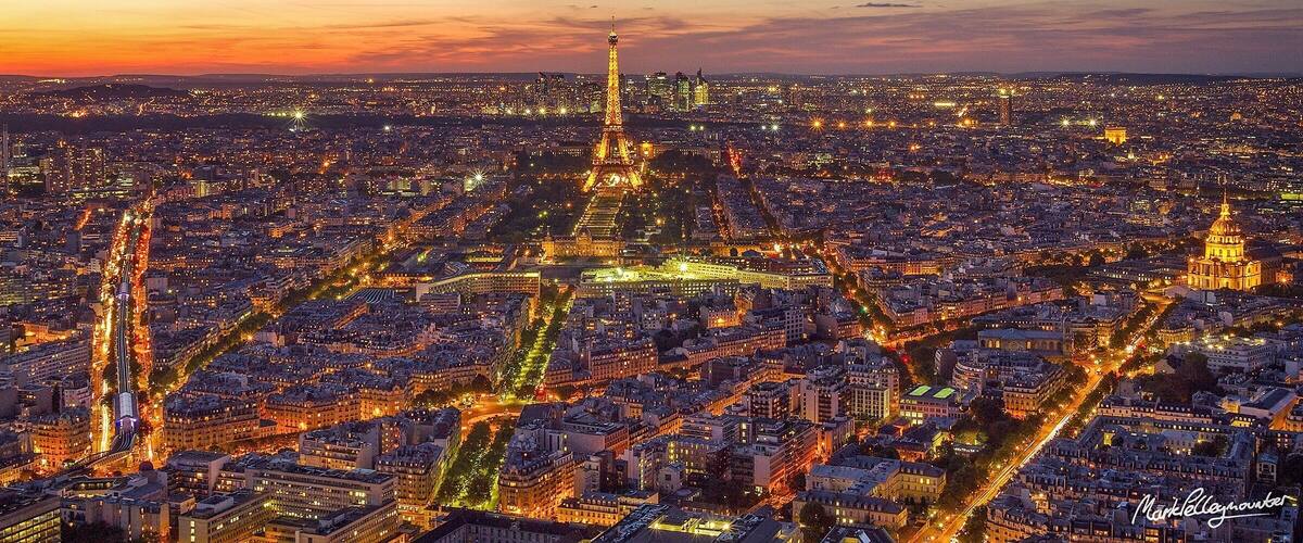 The open rooftop observation floor at Tour Montparnasse in Paris is a great location to get views over Paris and is photographer friendly with gaps in the glass to allow unobstructed views as long as you get to your spot early.