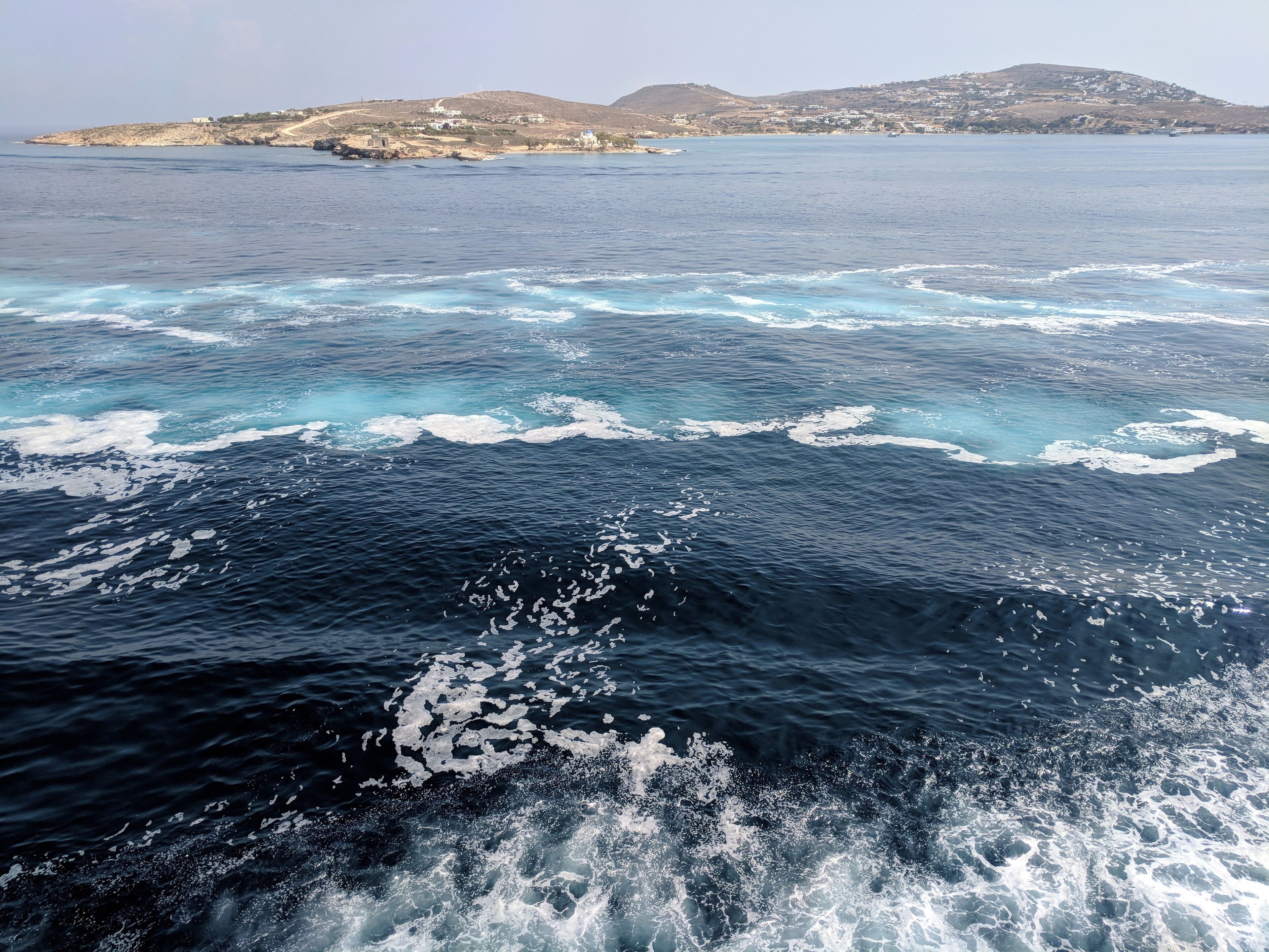 On the ferry, on the way to Paros Island from Athens. Early morning skies and early morning waters. Look at those colors! #culture Paros Island, Greece August 2018.