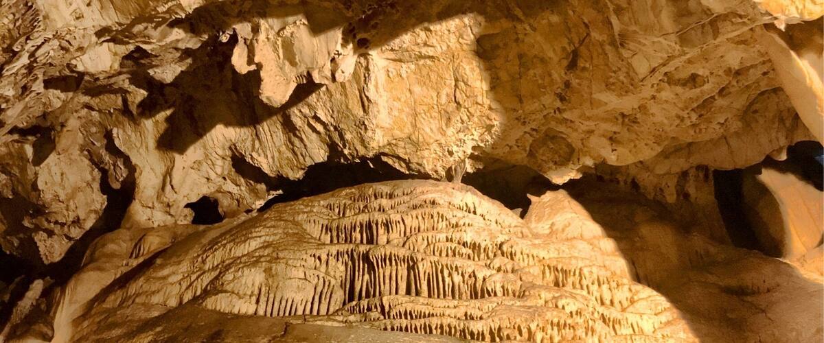 A cave with stalactites and stalagmites.