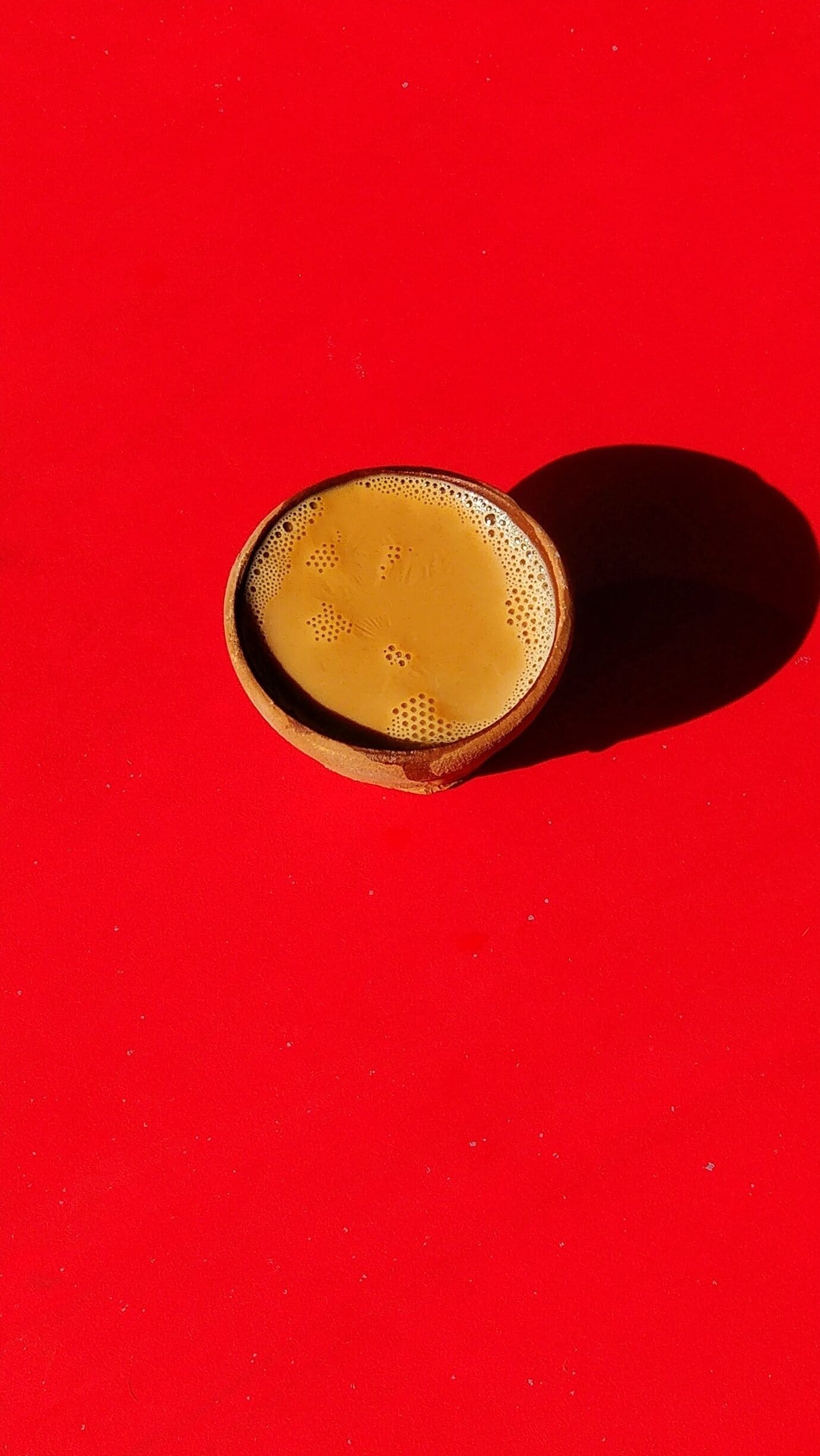 On way from Patna to Gaya.  Tea cup kept on table at a local stall on highway. #Red