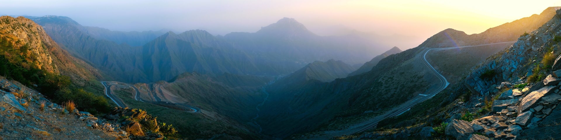 Panorama of a valley of mountains with road (HIGH RESOLUTION)