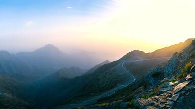 Panorama of a valley of mountains with road (HIGH RESOLUTION)