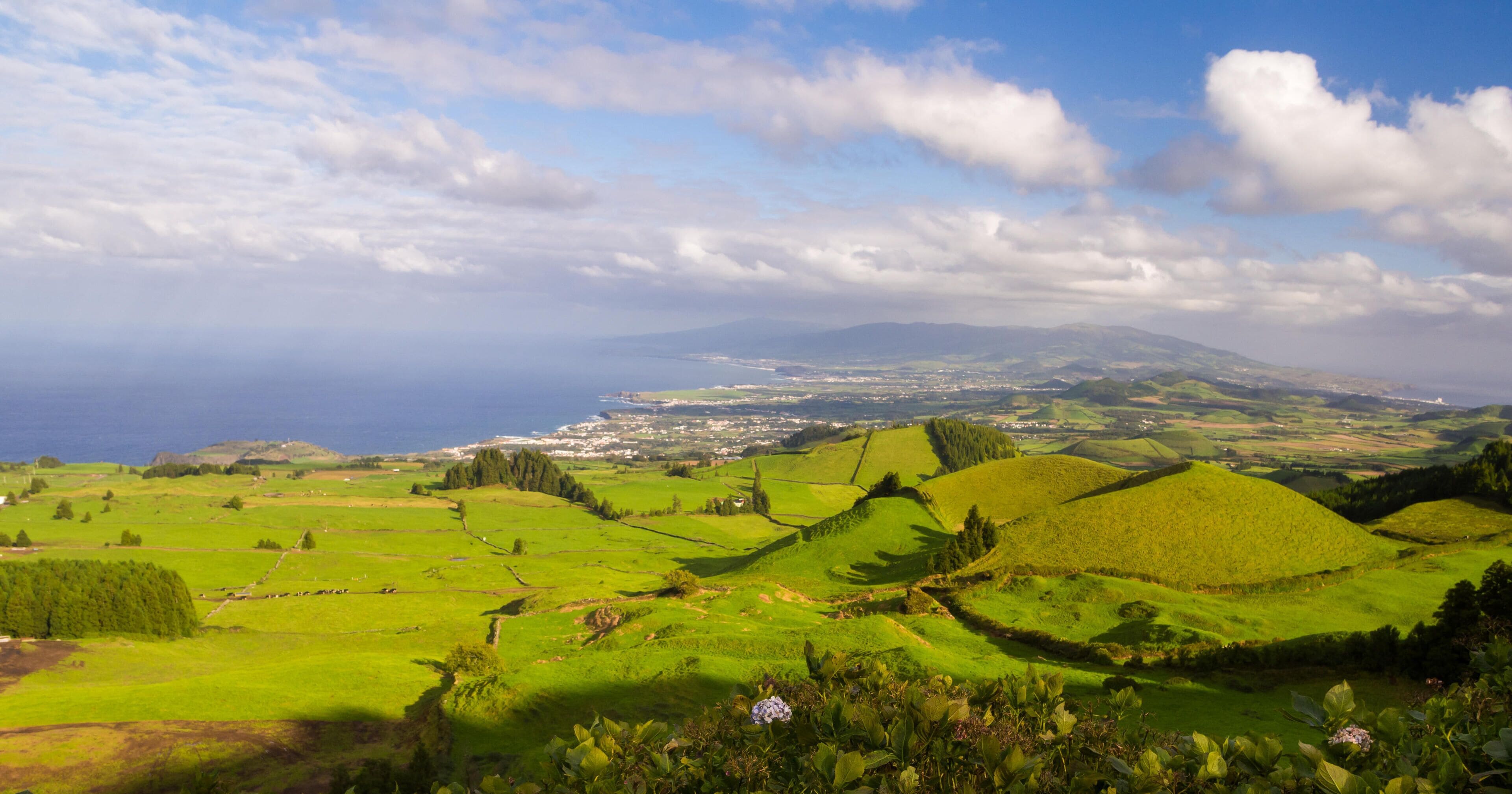 KM6315 Landscape in Sao Miguel Island, Azores, Portugal, as seen from Coal Peak viewpoint. Capelas and Ponta Delgada in the background