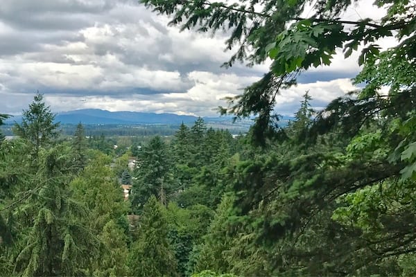 Cloudy but beautiful view of Mt. St. Helens from 2nd level gardens at The Grotto.