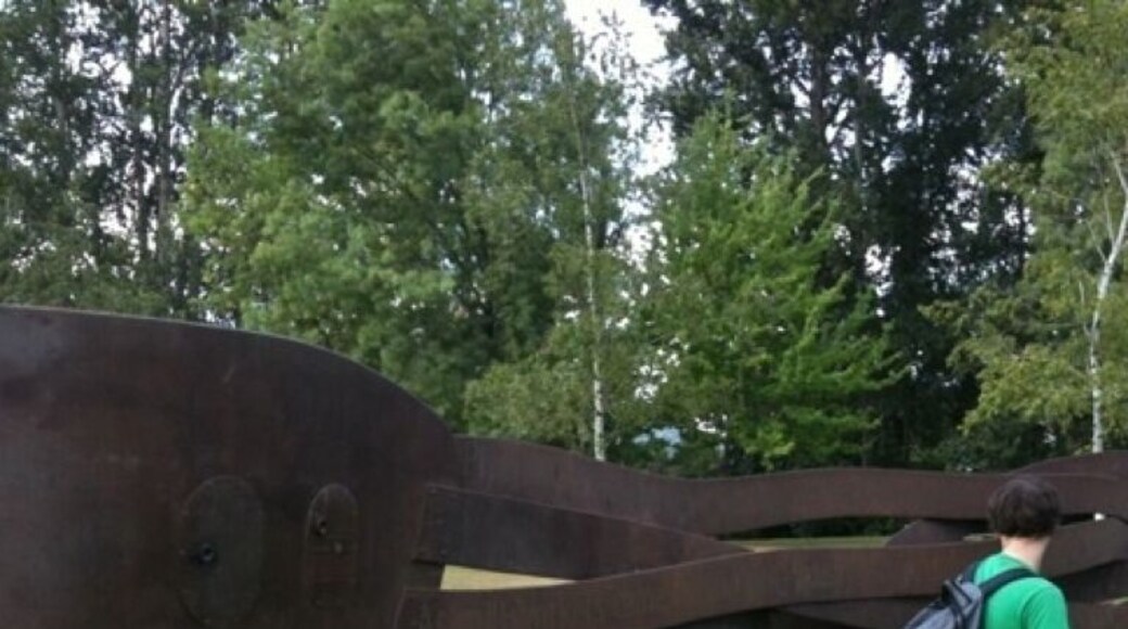 Large, interactive, public sculpture located beside the St. John's bridge, down the hill in Cathedral park. It includes viewfinders with old photos and musical elements.