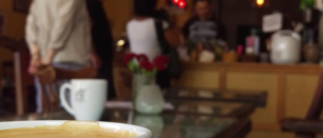 A must stop cozy, unique coffee shop with delicious eats. Love the wing back chairs and art. Xoxo