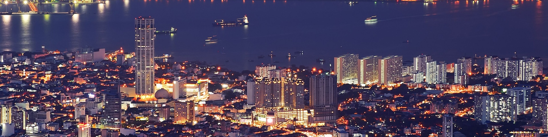 Cityscape of colorful night scene with river in Penang, Malaysia, Asia