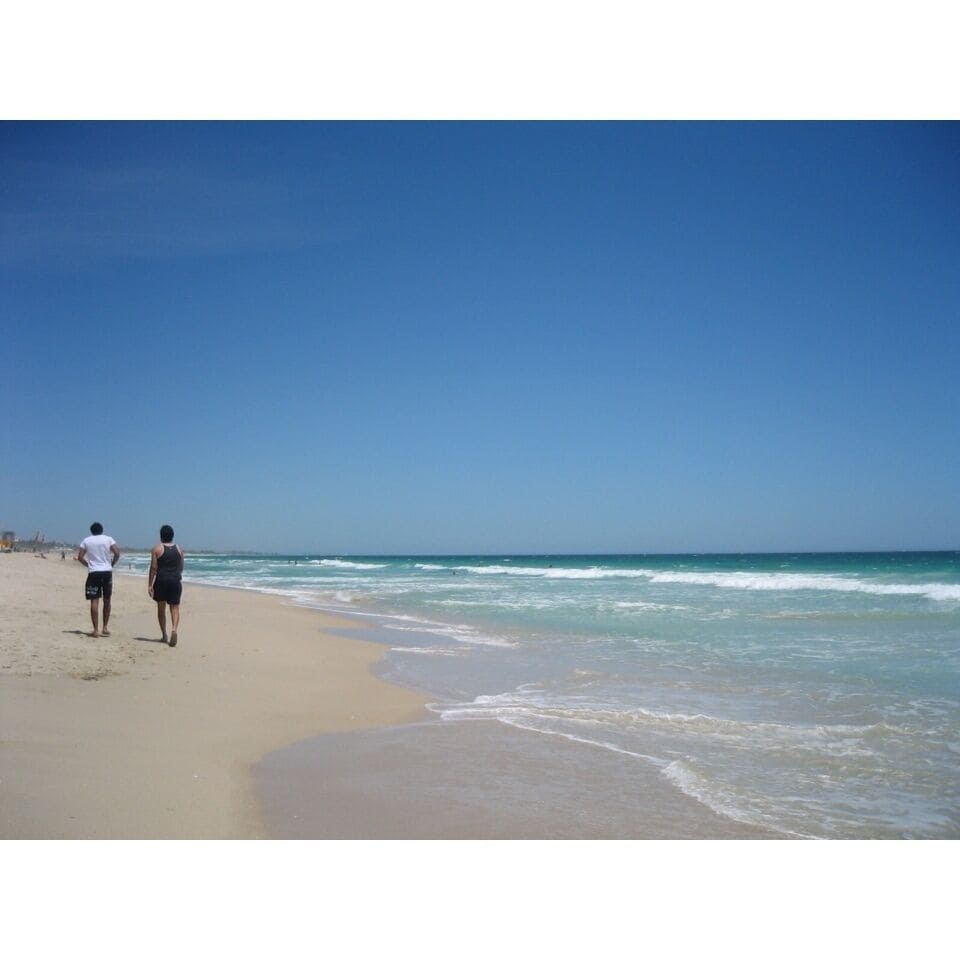 Bumming in the beach like this? Heaven! Perfect clear blue skies and see how wide the space out there. Calm water. I wouldn't ask more except for a sub-zero beer. 