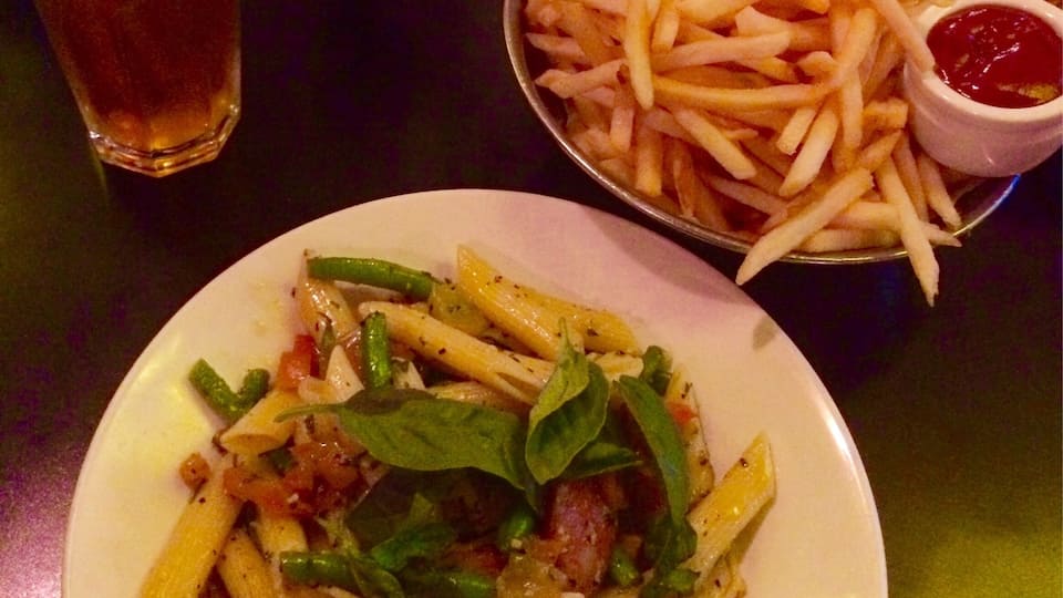 Terrible photo but pretty good value for money! Bar and restaurant. I had the vegetarian pasta with added sausage lol