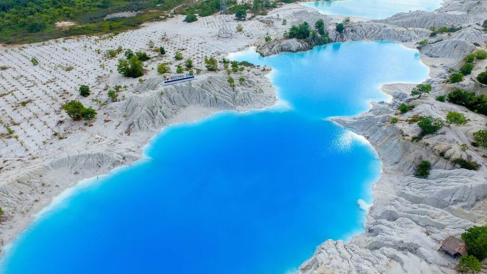 Beautiful kaolin lake in Bangka Indonesia, Blue lake kaolin quarry with turquoise water