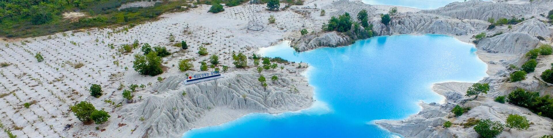 Beautiful kaolin lake in Bangka Indonesia, Blue lake kaolin quarry with turquoise water