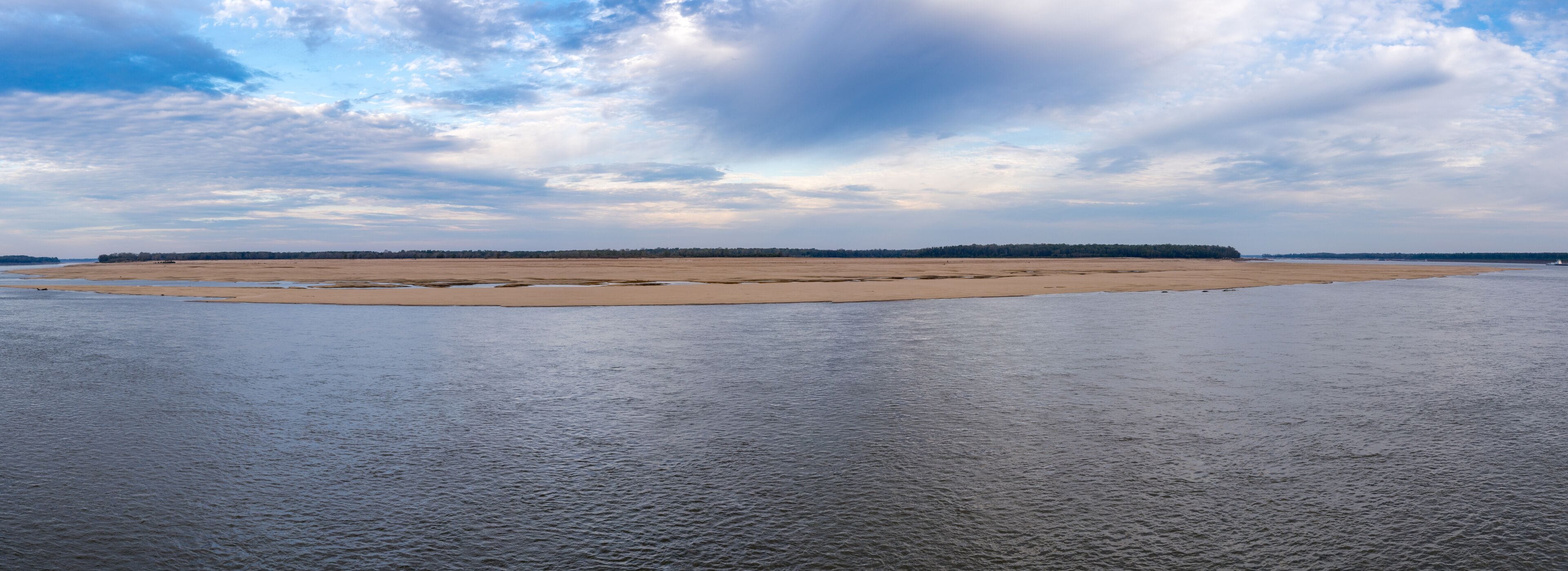 Panorama of sand banks due to extreme low water conditions on Mississippi river in October 2023 near Greenville, MS