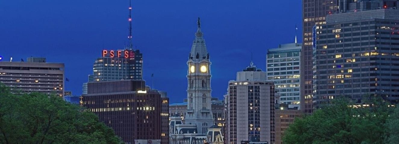 Looking over Benjamin Franklin Parkway in Philadelphia. I took this image from the steps of the Philadelphia Museum of Art during the golden hour. The museum is where Rocky Balboa ran up the stairs to a triumphant culmination of his training. Raising his hands up in victory as a metaphor for an underdog rising to the challenge.
