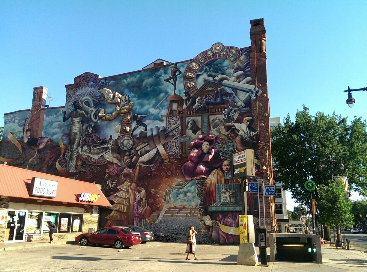 Beautiful, building-sized mural near downtown Philadelphia at S Broad and Lombard Streets. This work of art is called "Theater of Life" and was created by Meg Saligman in 2002. It's part of Philly's Mural Arts Program. There are many around the city. Makes a great self-guided walking tour. 