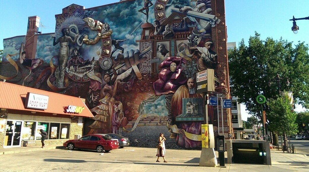 Beautiful, building-sized mural near downtown Philadelphia at S Broad and Lombard Streets. This work of art is called "Theater of Life" and was created by Meg Saligman in 2002. It's part of Philly's Mural Arts Program. There are many around the city. Makes a great self-guided walking tour.