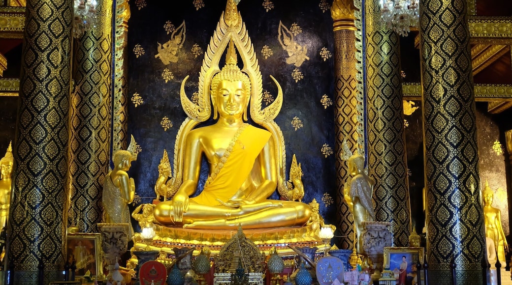 Beautiful The attitude of subduing Mara Buddha Image in Thailand . In Sukkhothai period .The Lord has a wide elbow 5 1 5 creep natak inches (2.875 m) high seven cubit (3.5 meters) with cast polished bronze Buddha.