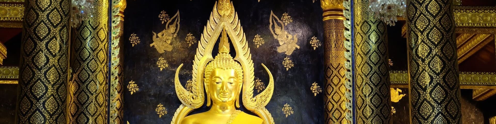 Beautiful The attitude of subduing Mara Buddha Image in Thailand . In Sukkhothai period .The Lord has a wide elbow 5 1 5 creep natak inches (2.875 m) high seven cubit (3.5 meters) with cast polished bronze Buddha.