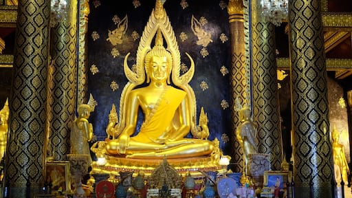 Beautiful The attitude of subduing Mara Buddha Image in Thailand . In Sukkhothai period .The Lord has a wide elbow 5 1 5 creep natak inches (2.875 m) high seven cubit (3.5 meters) with cast polished bronze Buddha.