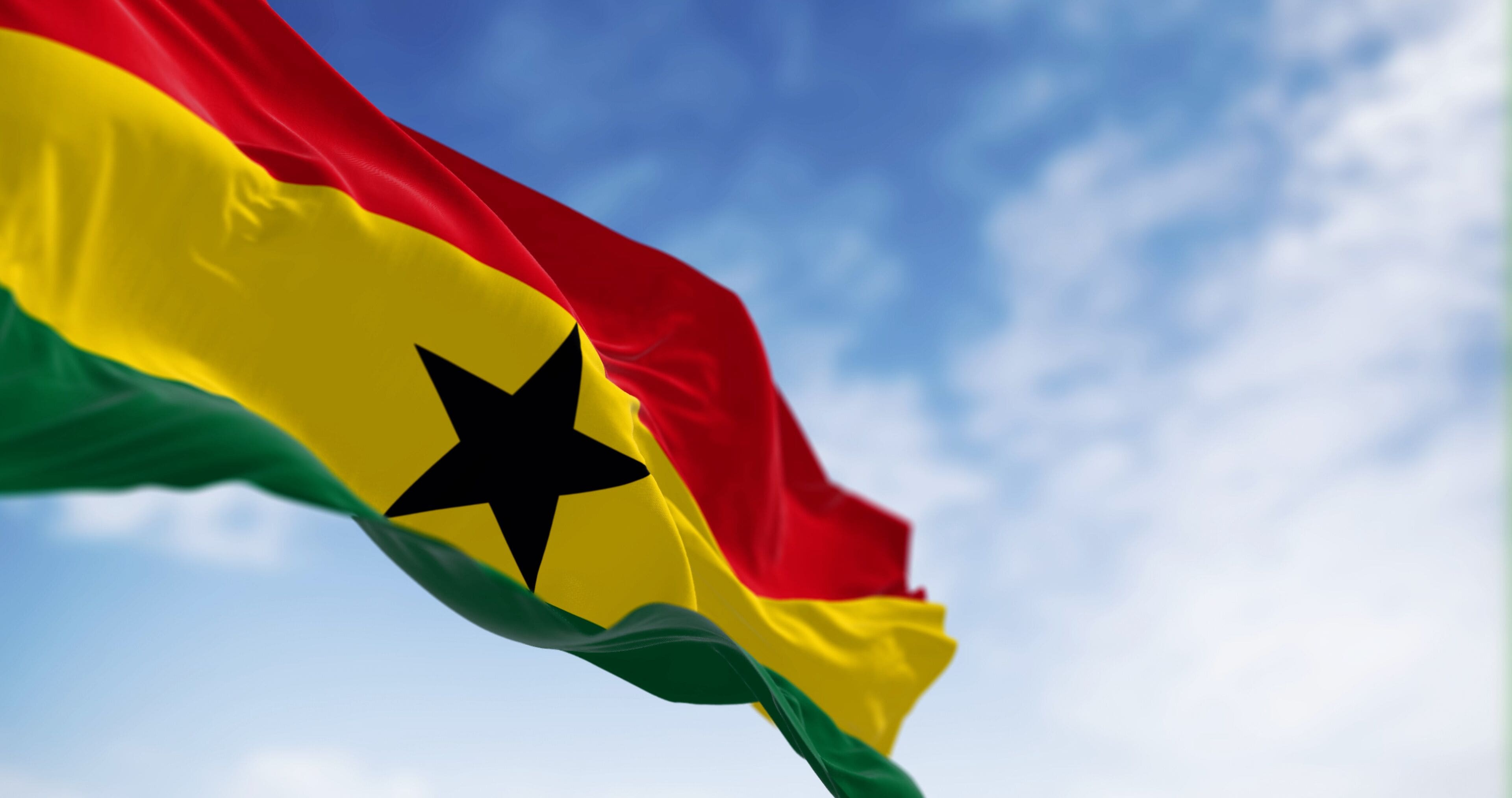 National flag of Ghana waving on a clear day