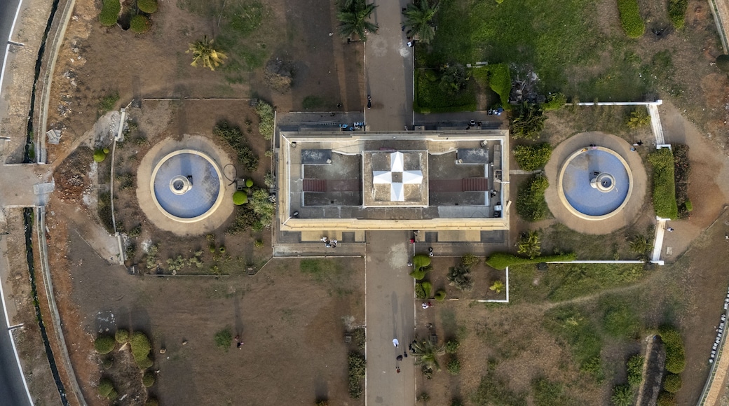 Aerial view of Black Star Square featuring its iconic central monument, symmetrical fountains, and paved walkways surrounded by landscaped grounds in Accra, Greater Accra Region, Ghana.