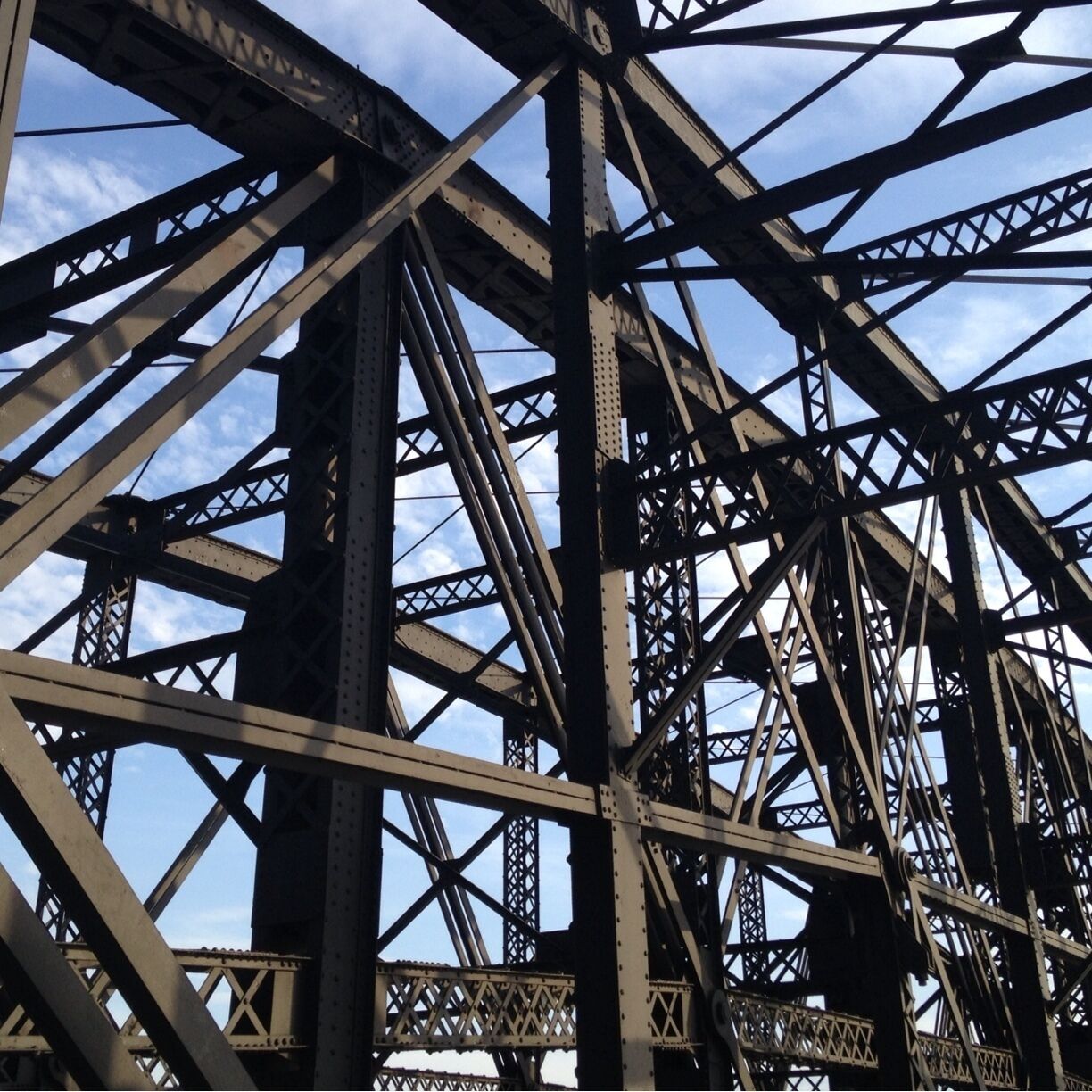 The Hot Metal Bridge is one of Pittsburgh's most distinct bridges--and considering there are over 300 of them in the city, that's saying a lot. Technically speaking, it consists of two different bridges, one being the aforementioned, and the other the "Monongahela Connecting Railroad Bridge". Although, if you ask where the Monongahela Connecting Railroad Bridge is, people will look at you like you have spinach in your teeth. There's a charming bike path on the side, and it's part of the GAP (Great Allegheny Passage), which goes all the way to DC. iPhone 4S photo