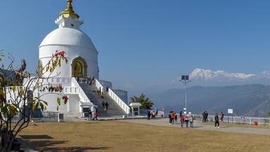 People visiting the World Peace Pagoda in Pokhara on Nepal